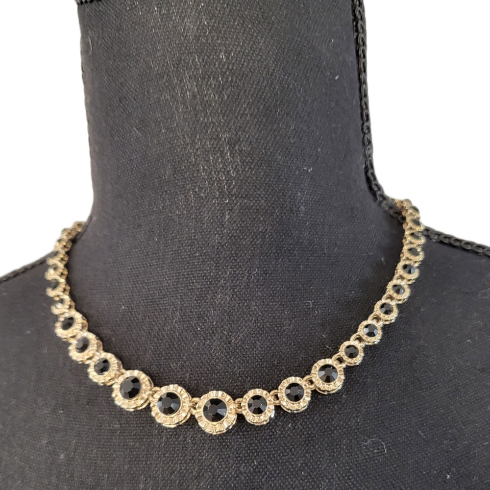 Express black and gold formal necklace